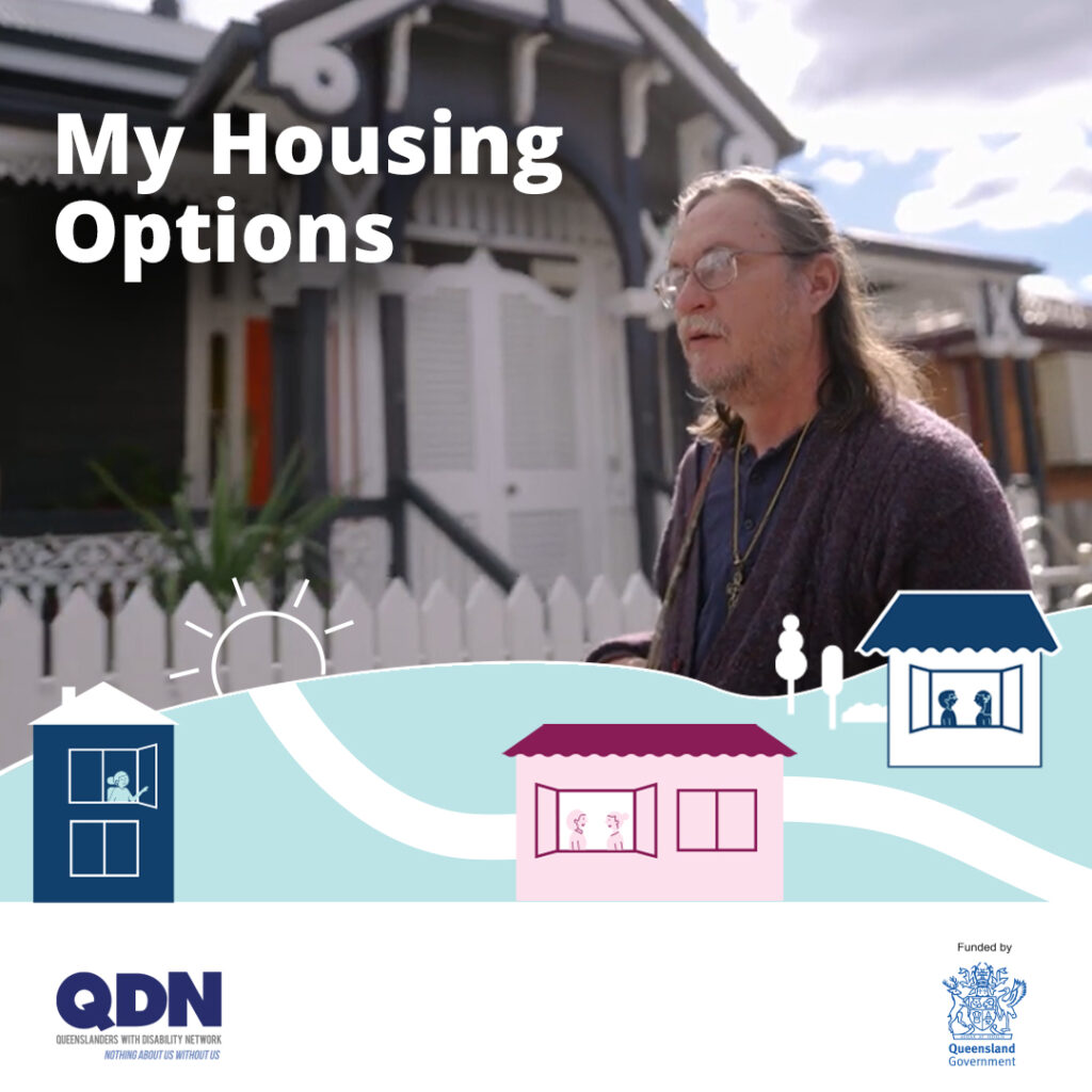 A picture of a man walking down a street.